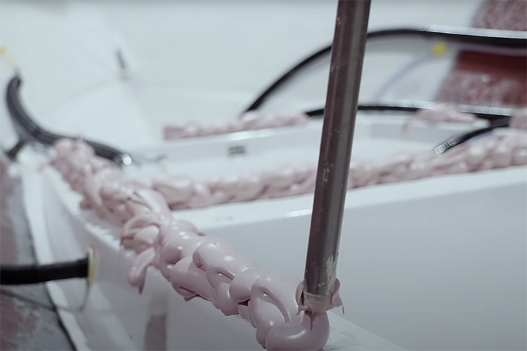 Image of polyester bonding putty being applied to a Sportsman Boats’ stringer