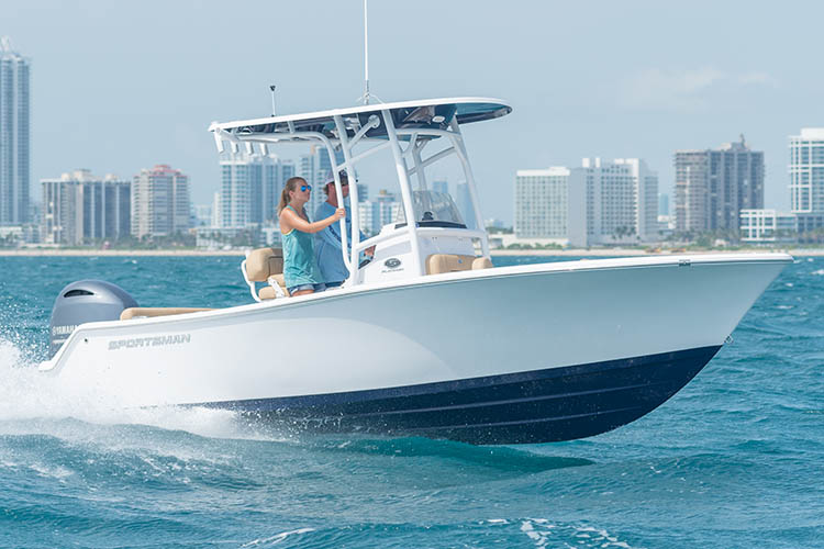 The Heritage 211 Center Console running through water.