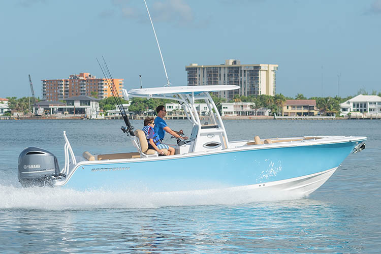 The Heritage 241 Center Console running through water.