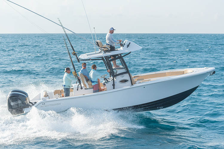 The Open 282TE Center Console running through water.
