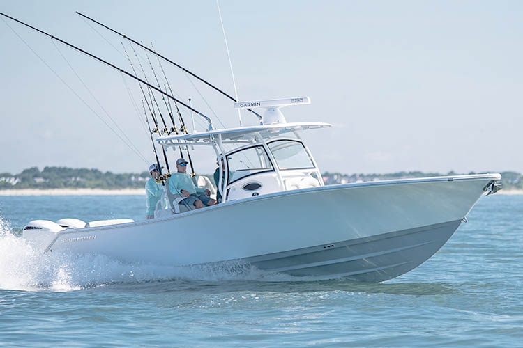 The Open 312 Center Console running through water.