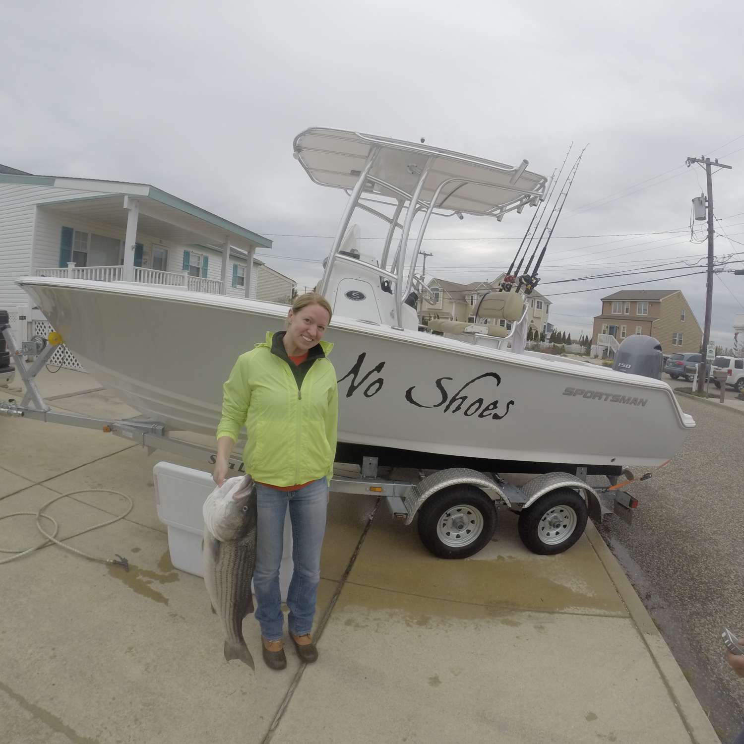 Brigantine, NJ.  Took my girlfriend out striper fishing in my brand new 212 open and hooked into this fatty on...