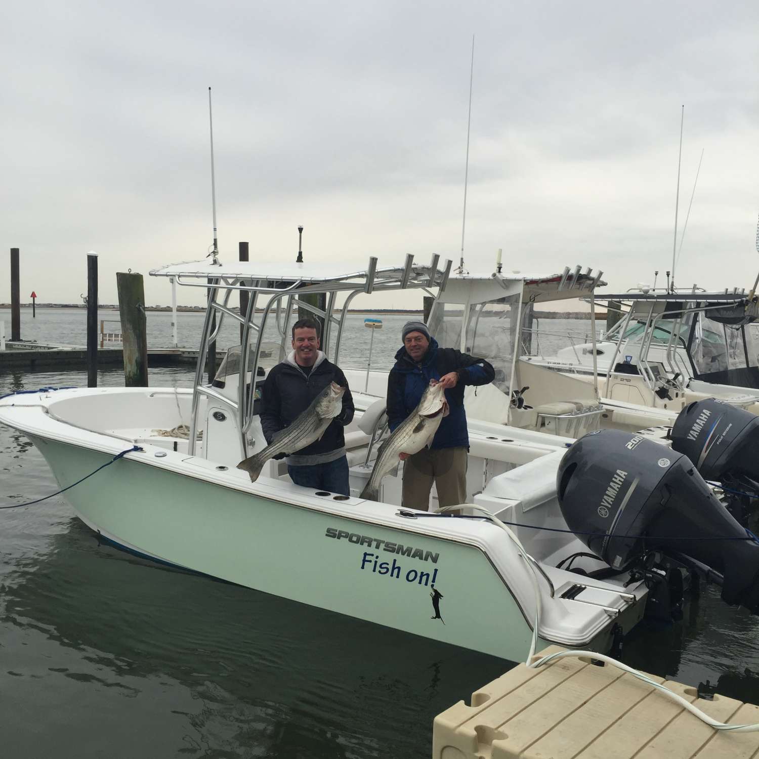 Sea Isle City, New Jersey. Boat is the brochure boat for 23 Open. 35" and 40" Stripers caught 1...