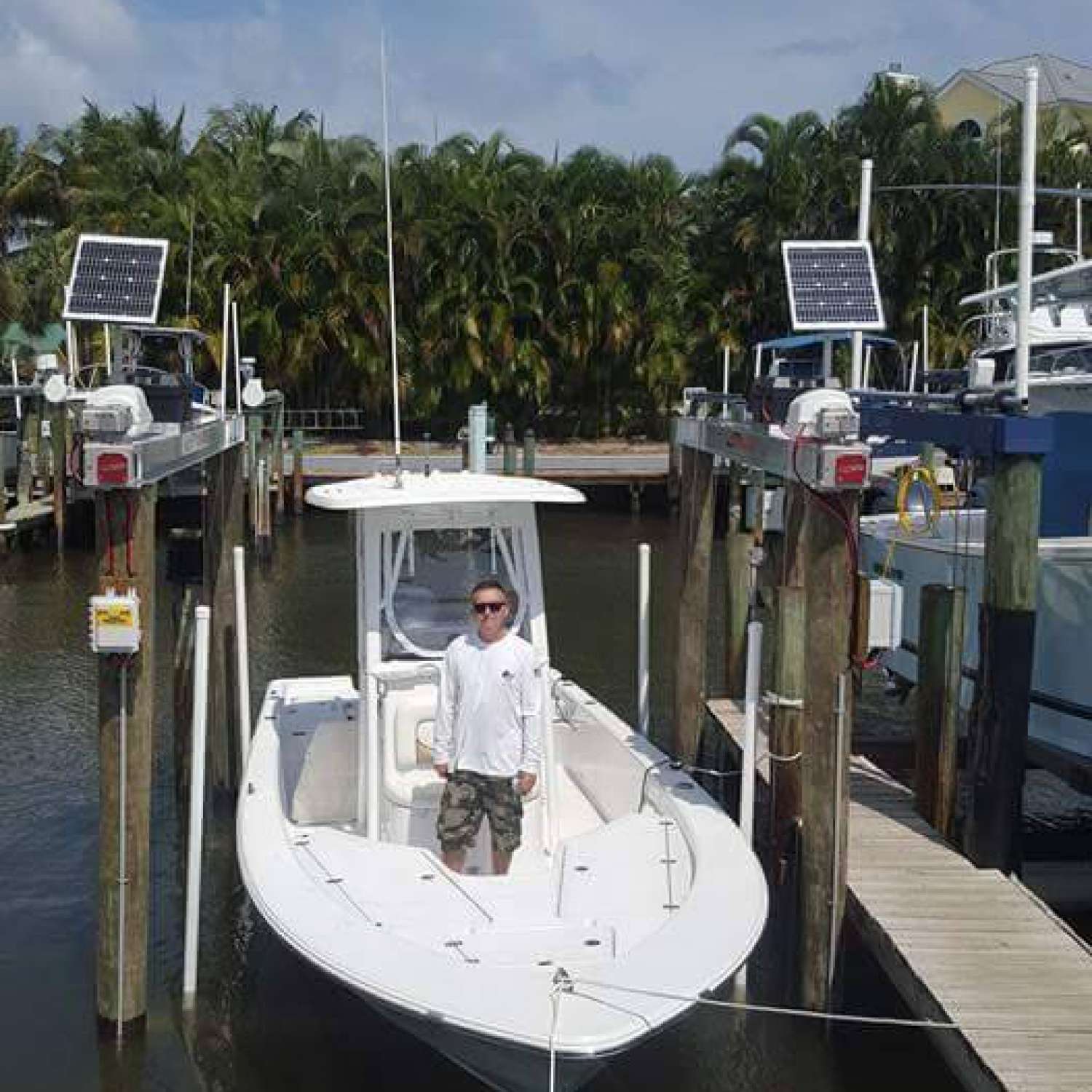 My photo shows me on our Sportsman  Masters 247  ion her brand new lift in our home port  of Stuart...