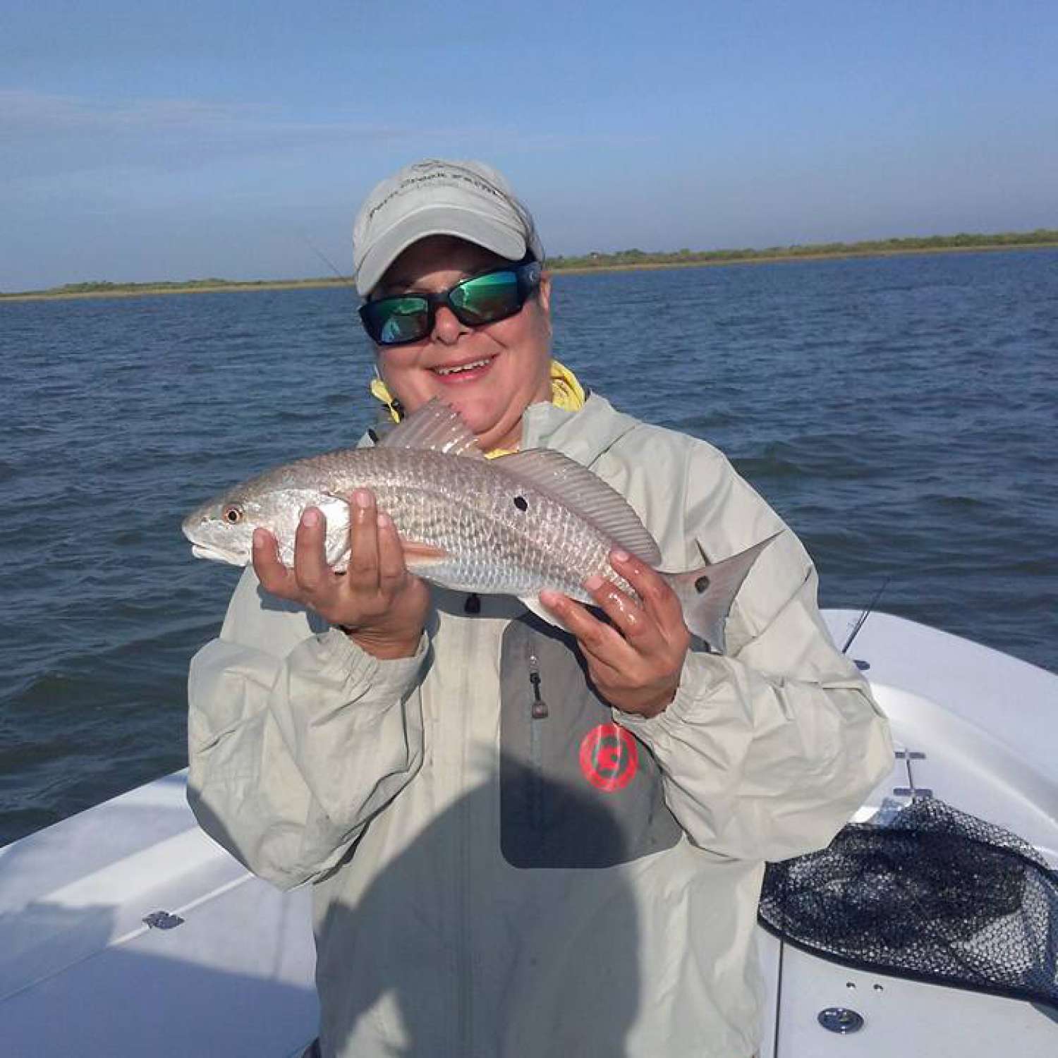 Tally with her first Redfish caught on a artificial lure.