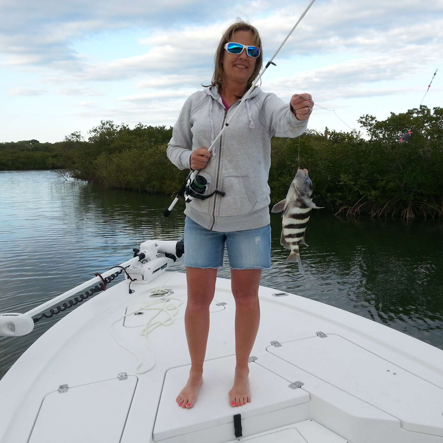 My photo was taken at spruce creek florida, Lori catch's one of the first Sheepshead that day.