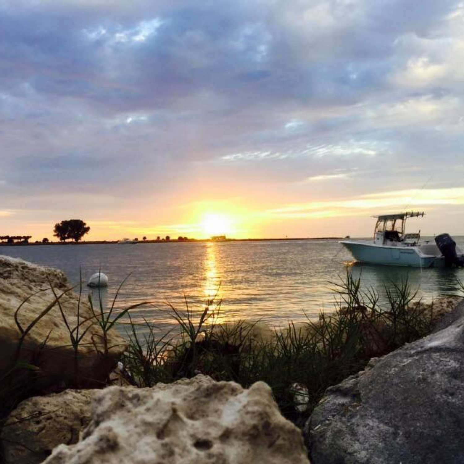 Sunset post spearfish dive at our favorite tiki bar.