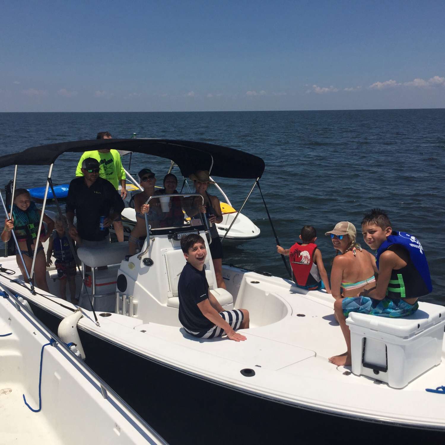 My photo was taken on Lake  Pontchartrain  during  the dog days of summer.   Enjoying fishing and family life