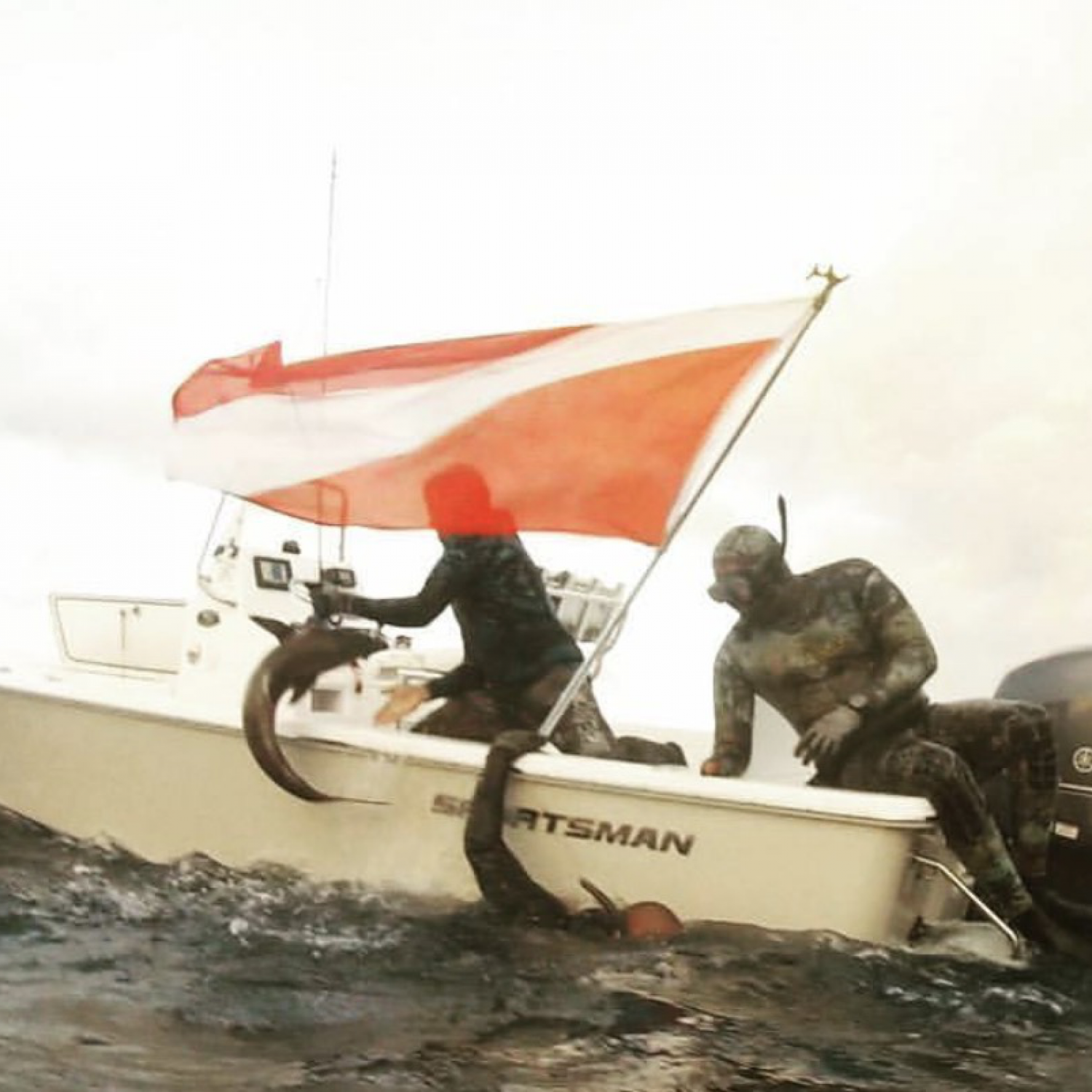 Photo was taken while tossing a nice size cobia into the boat after wrestling with a half dozen bull sharks!!!!...