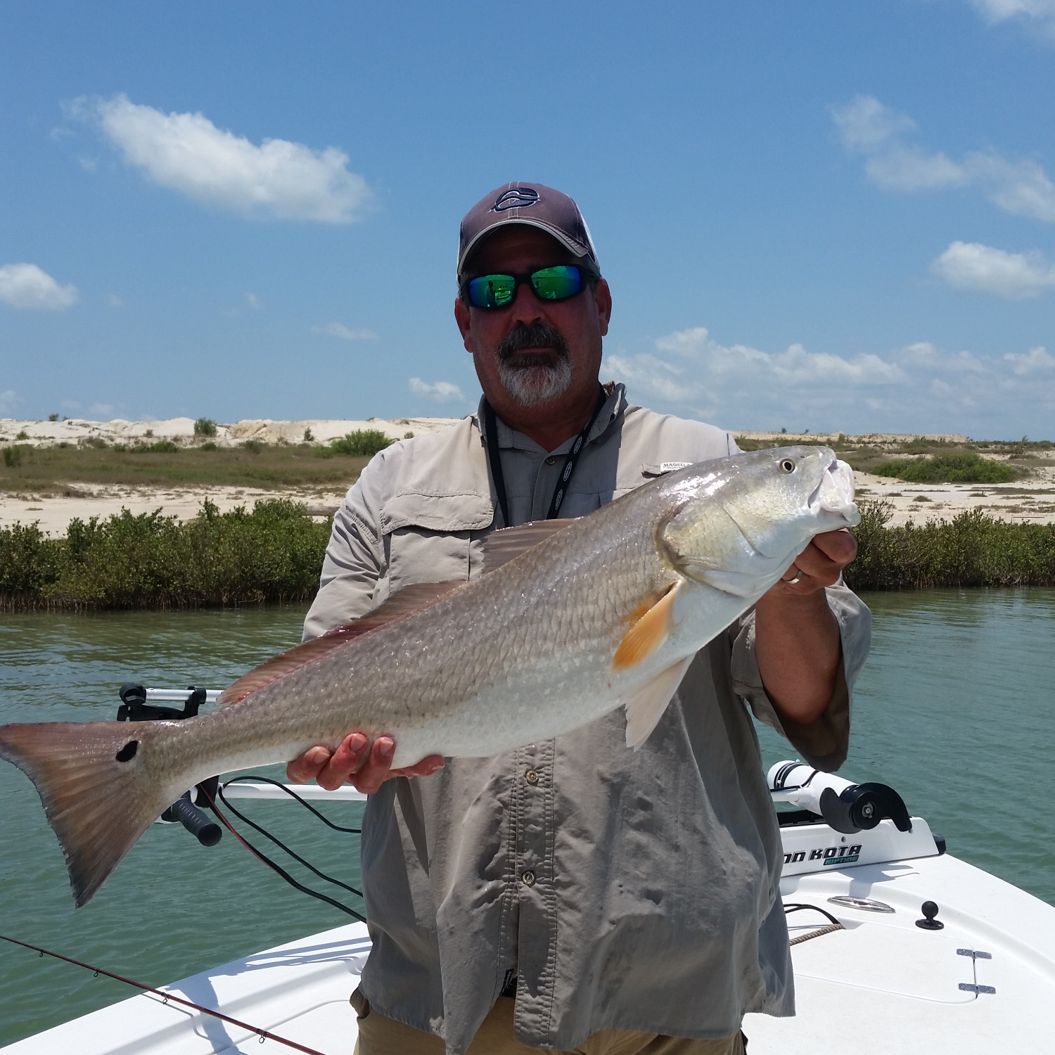 Title: Nice redfish - On board their Sportsman Tournament 214 Bay Boat - Location: Ingleside texas. Participating in the Photo Contest #SportsmanDecember2017