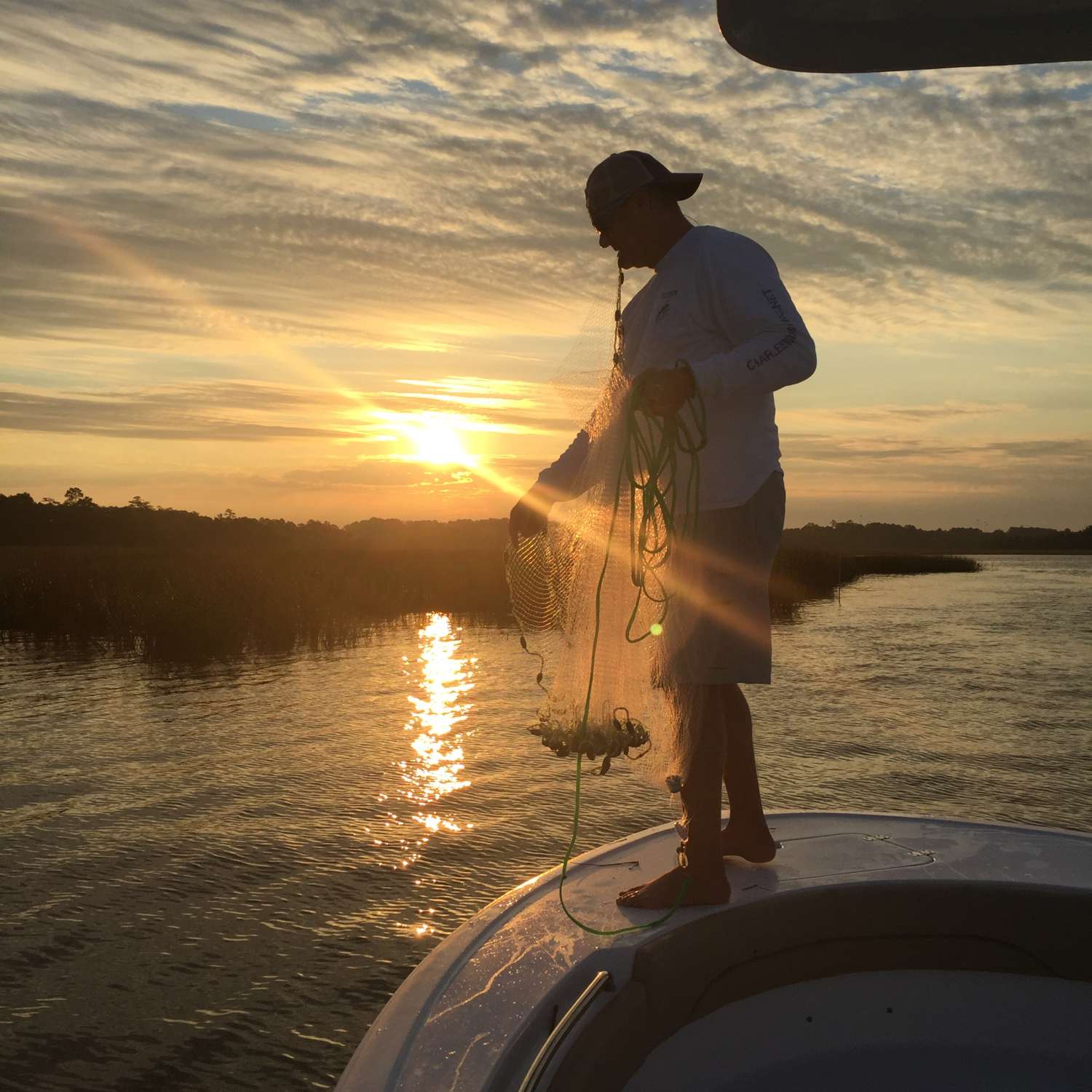 Cast netting on the Wando before heading to the jetties for bull reds