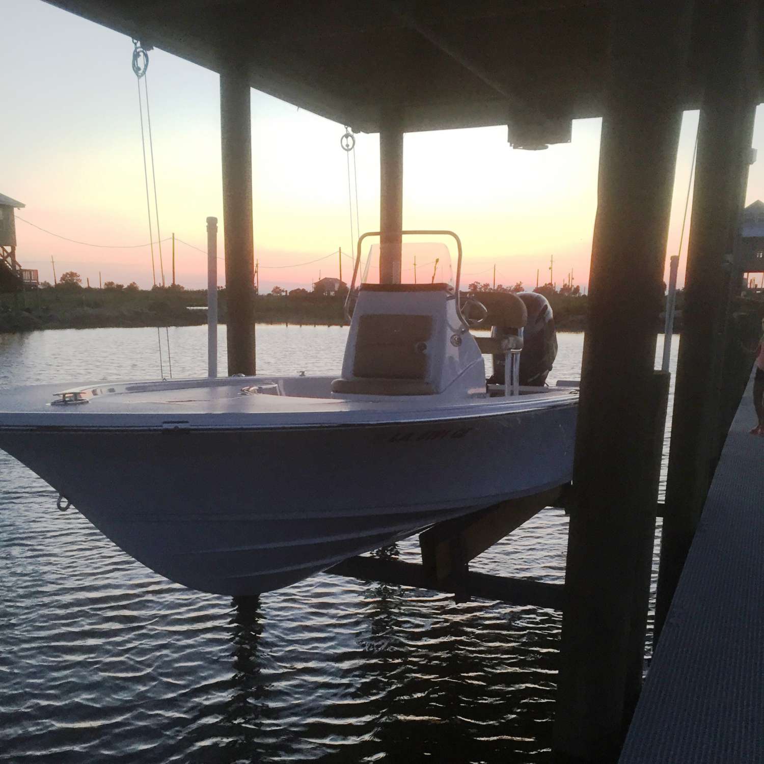 Photo taken at our lake house on Lake St. Catherine outside of New Orleans after putting her up for the...