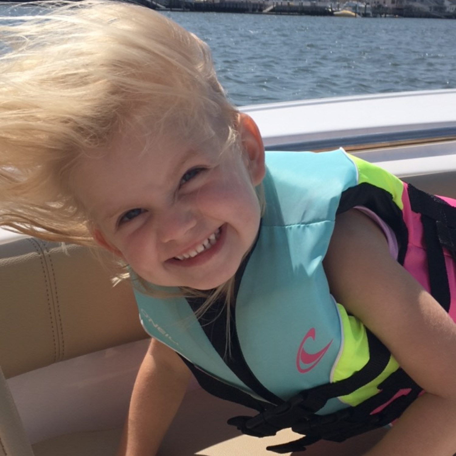 Lizzie enjoying the wind in her hair on a cruise through the bay of Sea Isle!