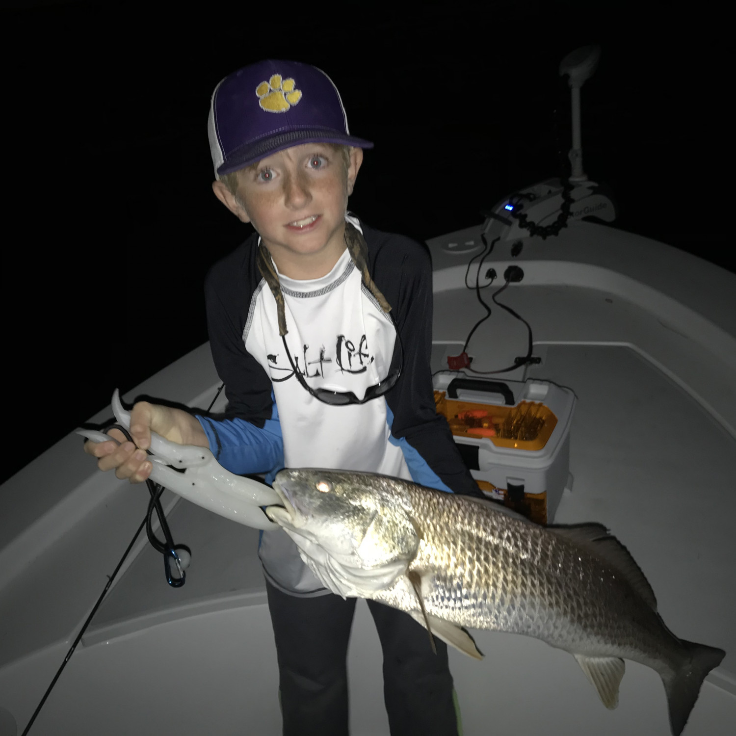 This is Justin’s first over slot redfish. He loves fishing very very much.