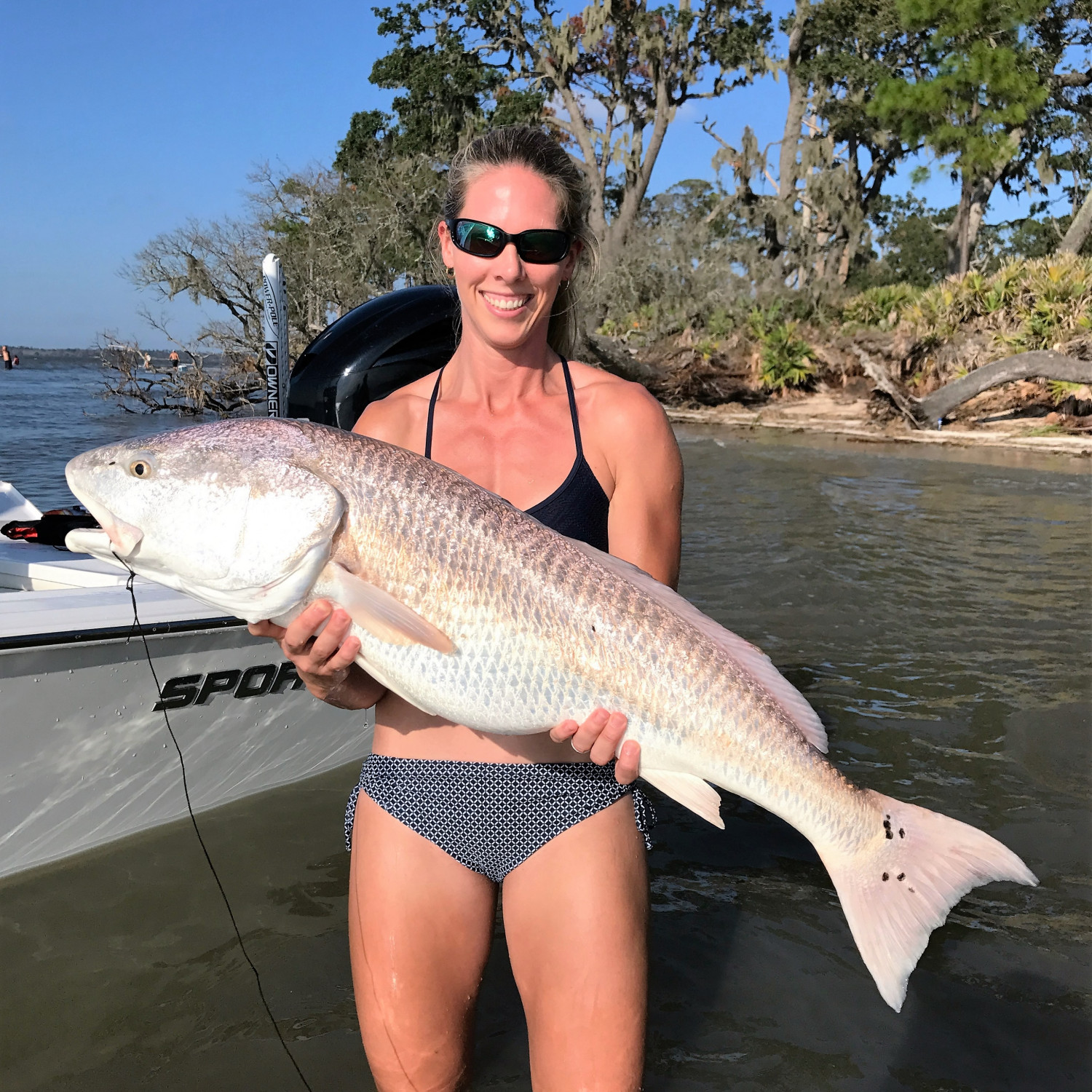 My wife Laura with a very nice Red Fish.