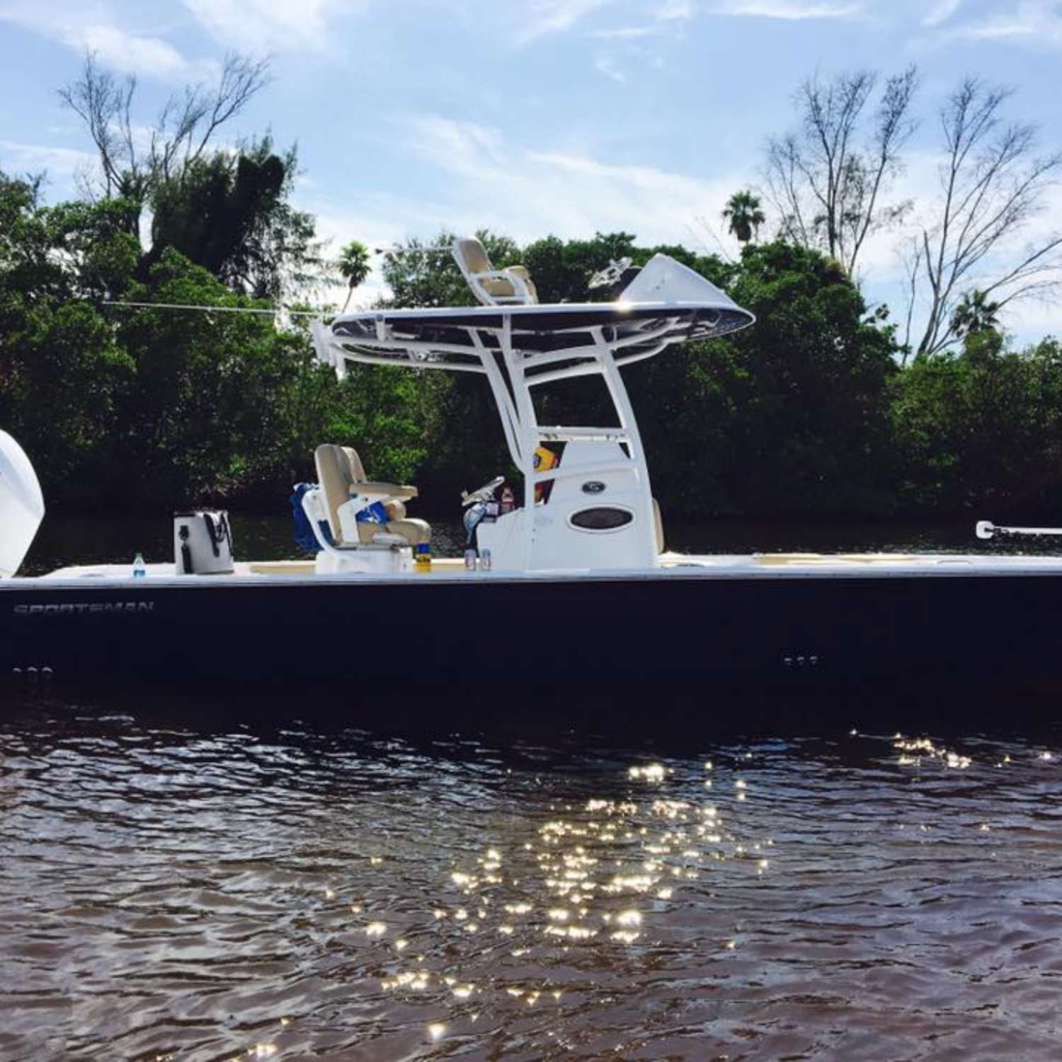 My photo was taken on the sand bar in Lyons Bay, Venice, Florida.  At the sand bar with family and...