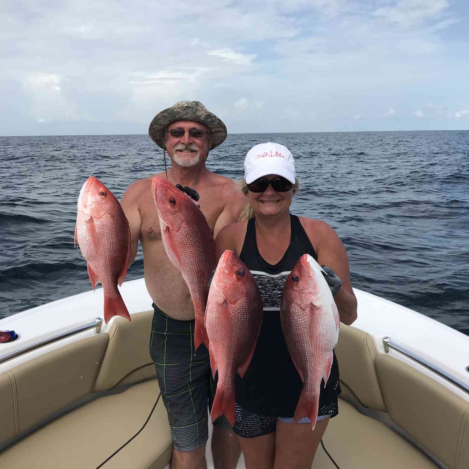 Teresa and I enjoying the snapper season in our new boat.  First year fishing with it.   Love it!