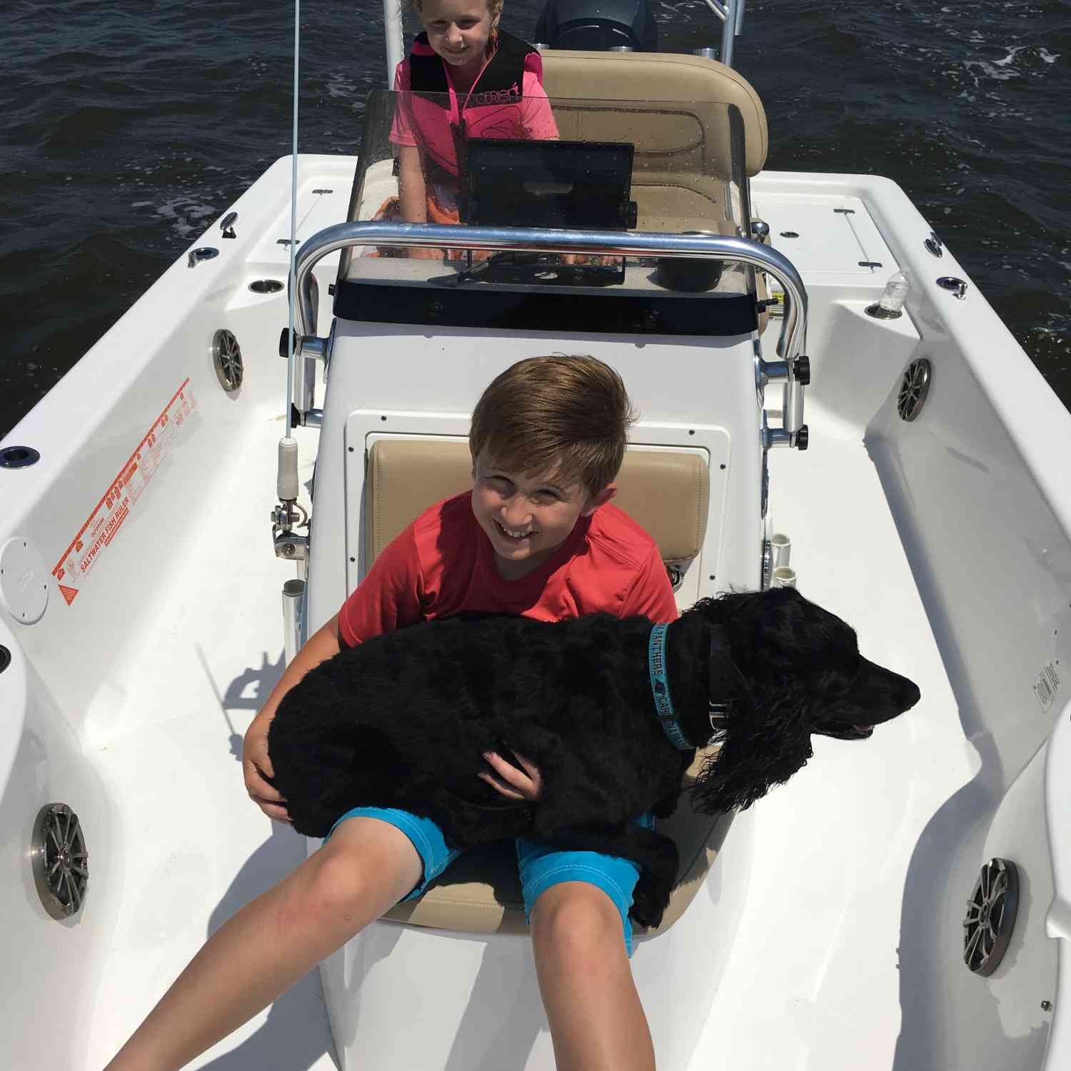 The kids and their pup enjoying the Carolina summer in our Masters 207