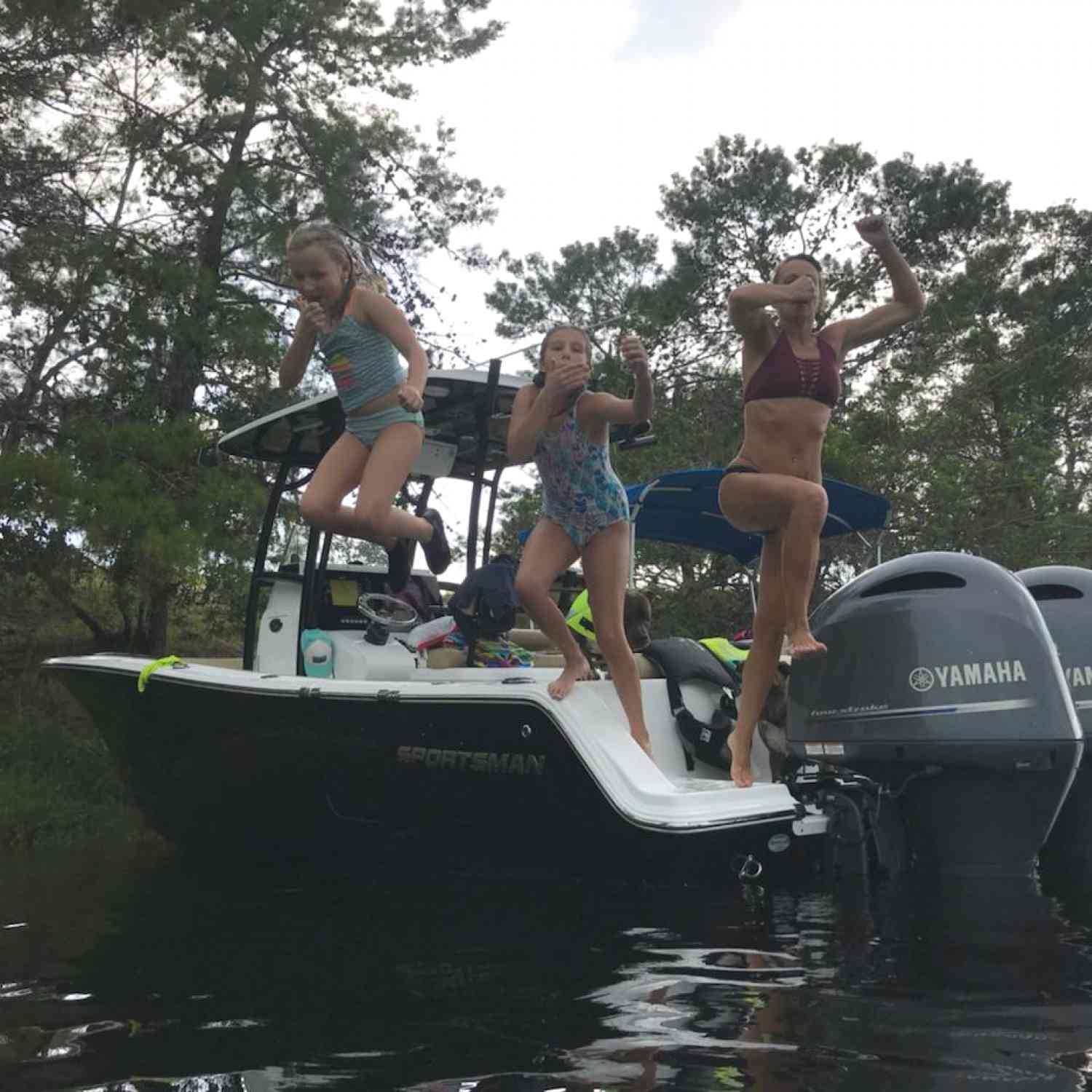 Jumping into the river with my nieces