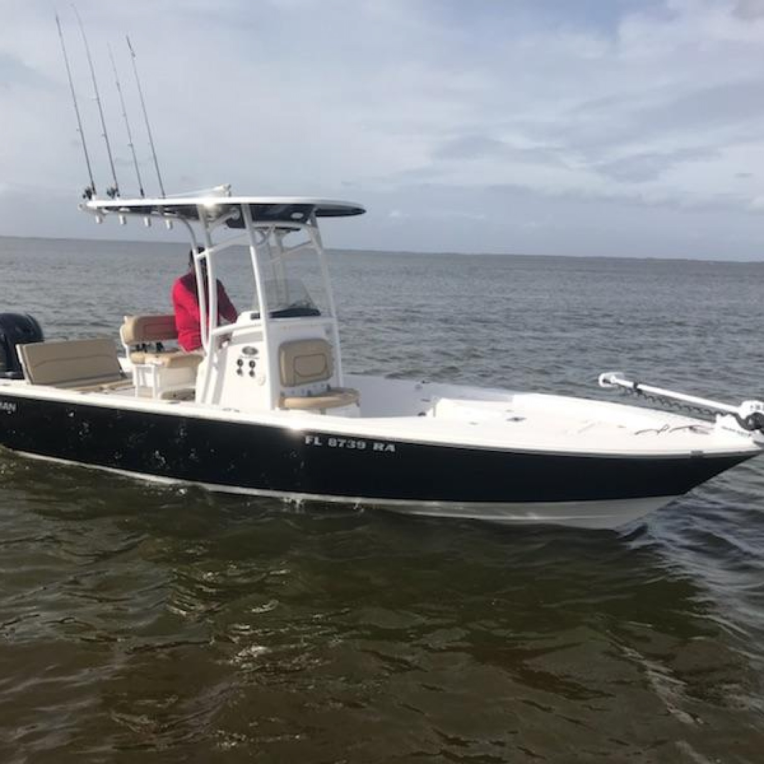 Picking up wife and man's best friend at local dock when she snapped this picture. Gotta say "This boat is...