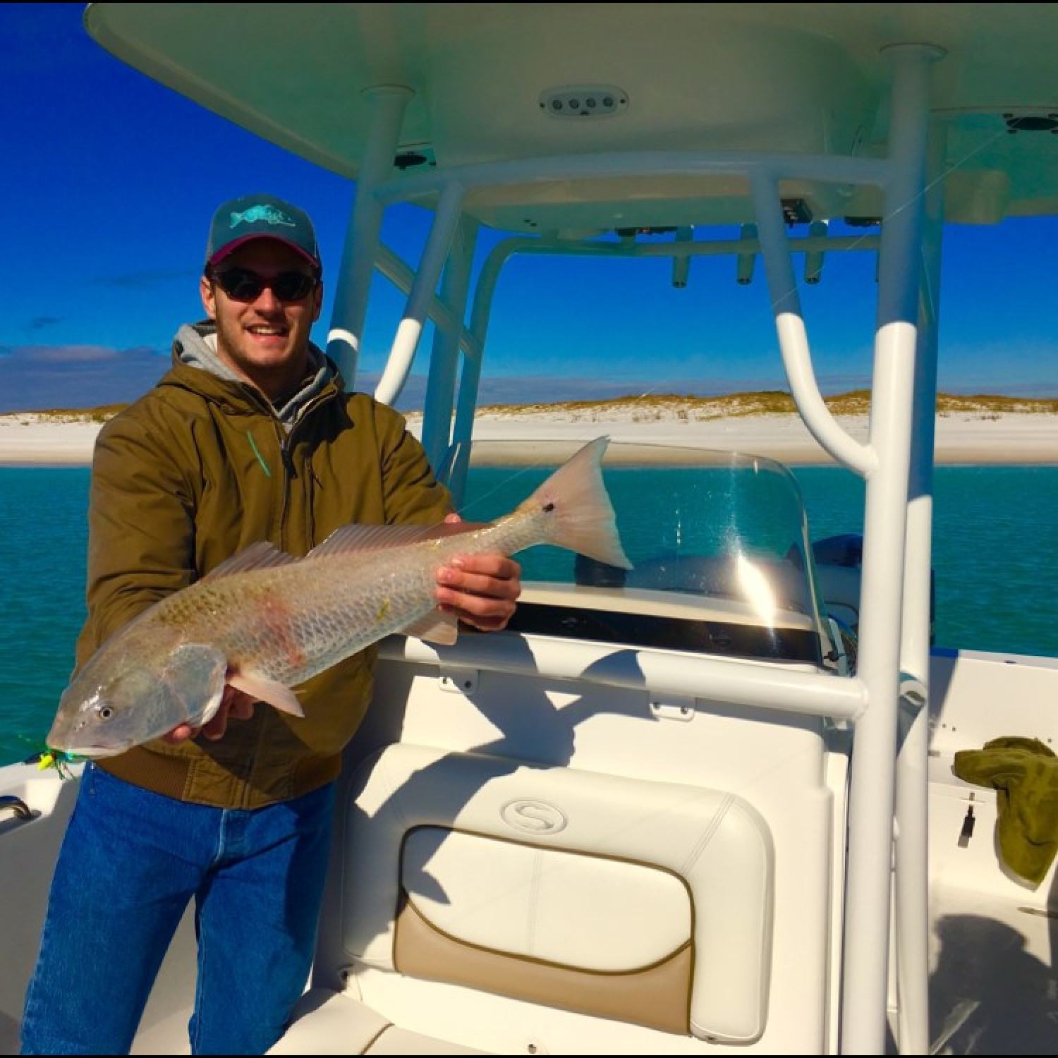 32" Redfish caught just off the beach near Destin Florida on a clear winter Florida Day.