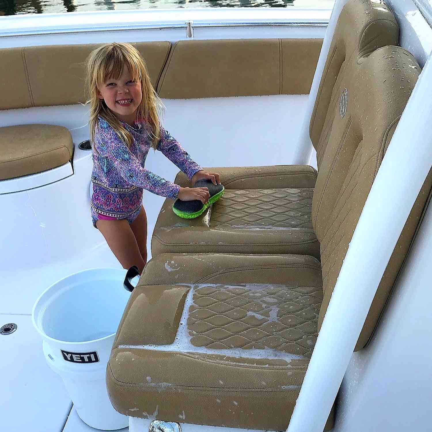 Our 4 year old, Charlee Rose Earle as the best deck hand ever.