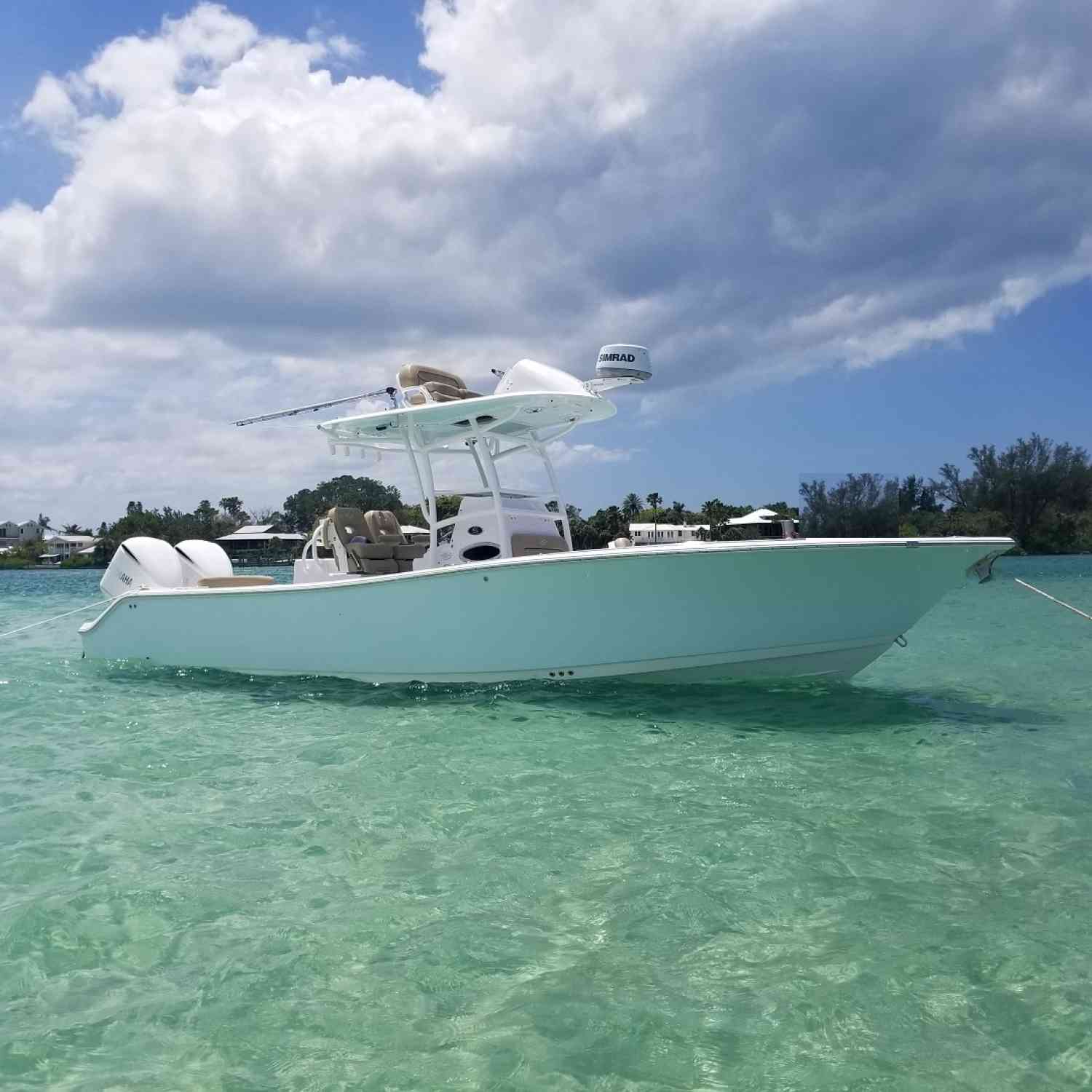 Our first weekend with the boat just hanging out on the sand bar after a great day of fishing.