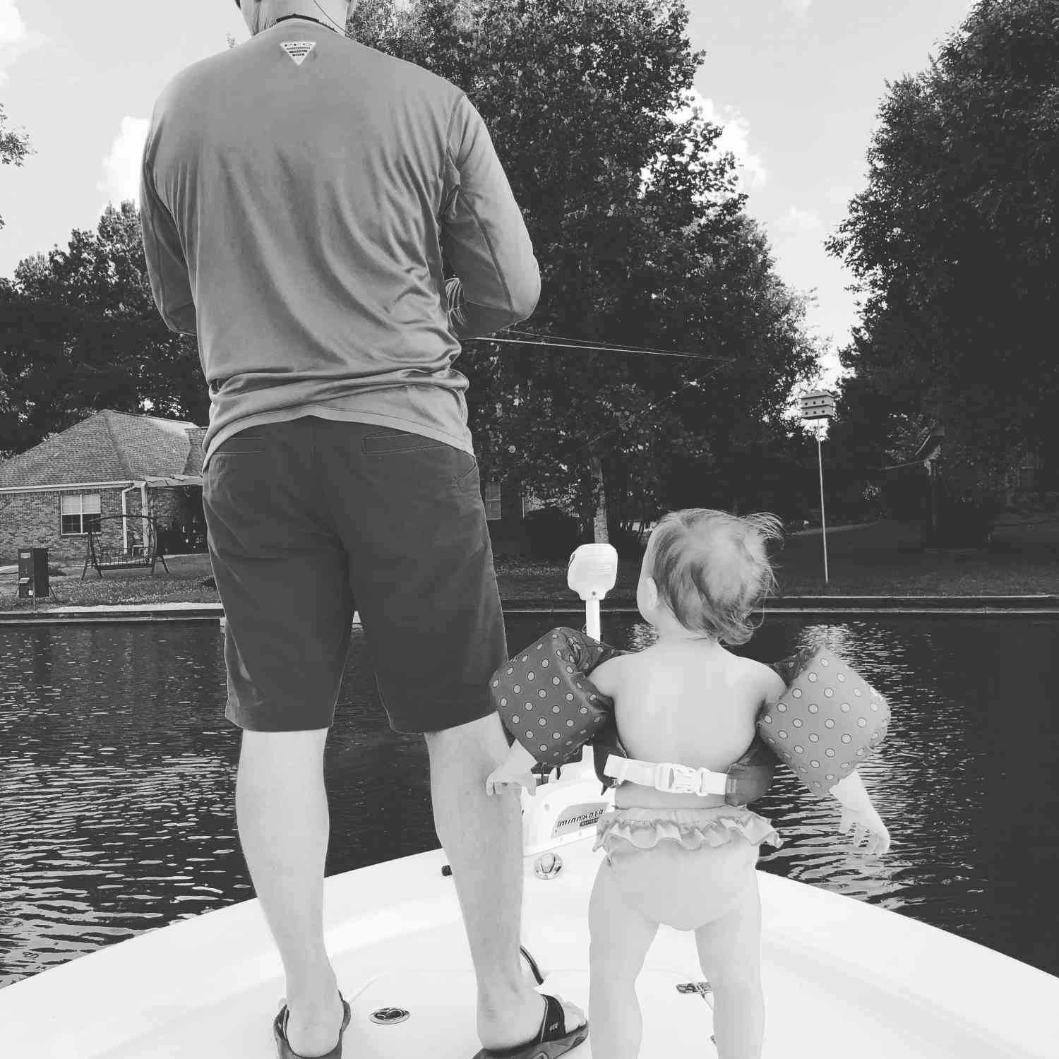 A picture of our preemie ( she weighted 3lbs 3oz) now she’s 23lbs & absolutely LOVES riding on the boat...