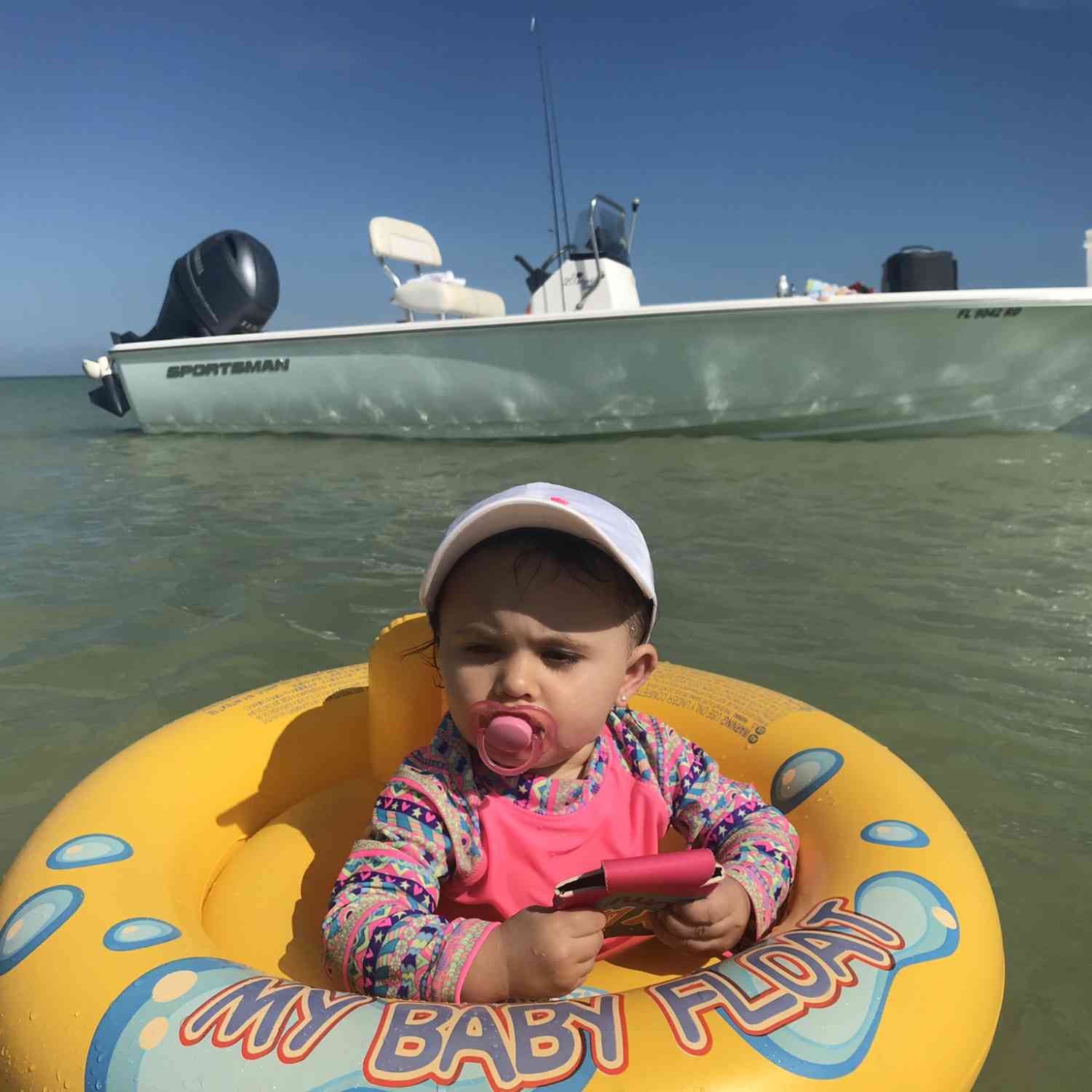 Our girl’s first trip to the beach by our Sportsman.