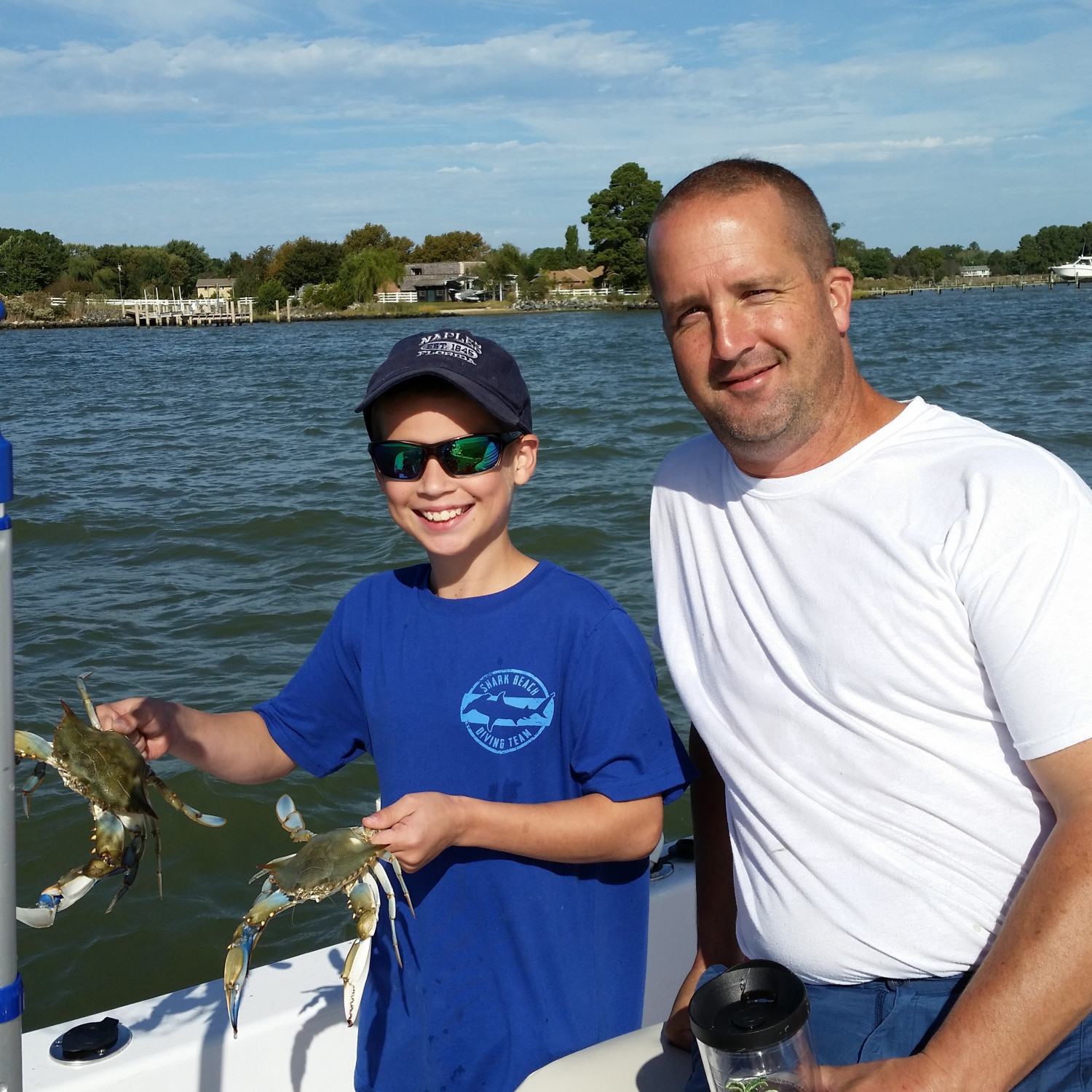 I took this photo on our first crabbing trip on the boat of My husband and my son!  We love...