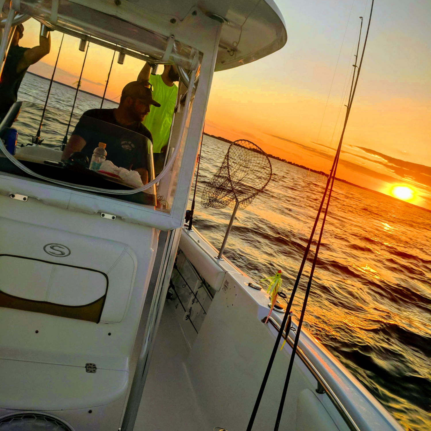 Jigging for rock fish on the Chesapeake bay the sun was setting on a beautiful calm night !