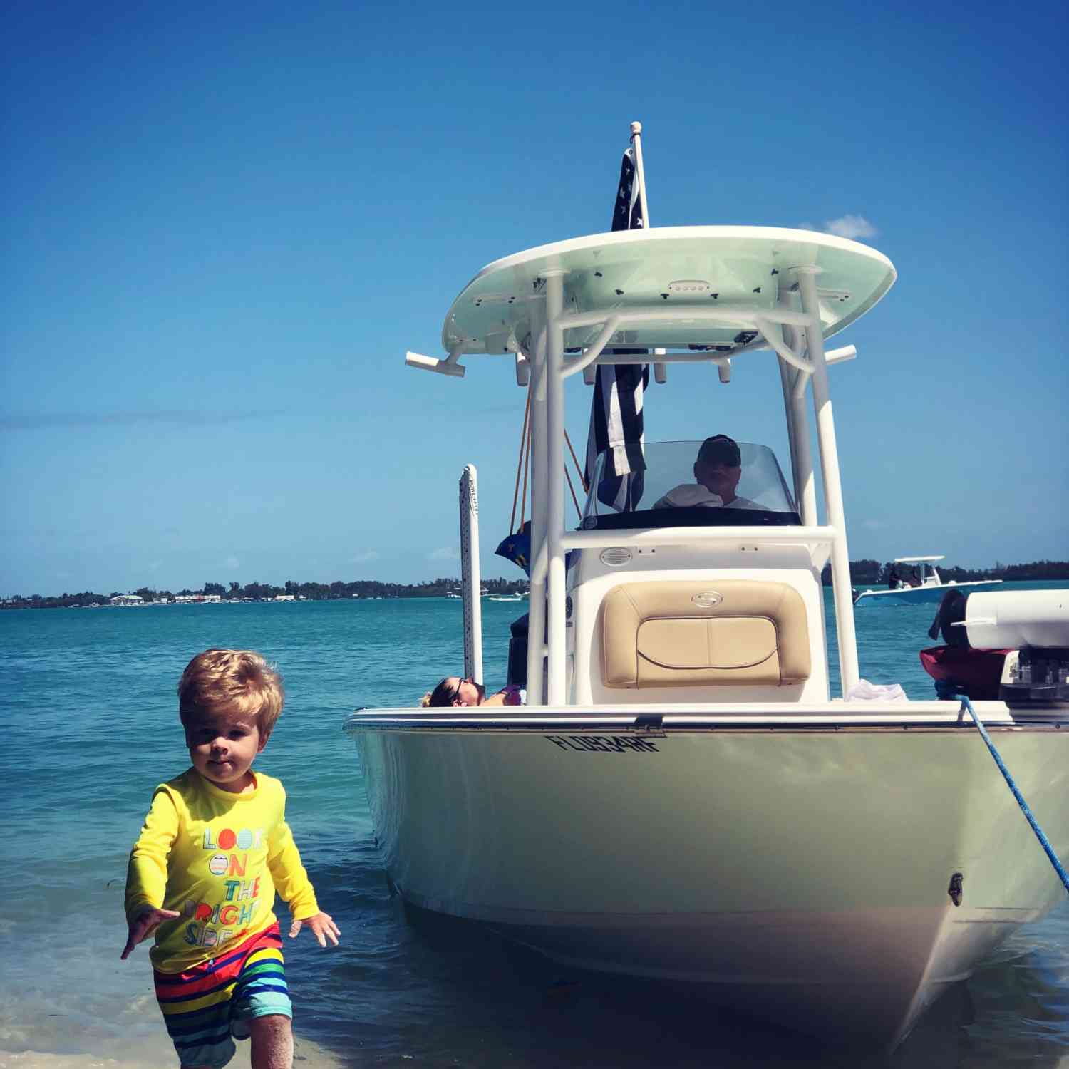 Grandson Bryson have fun in the water and sand.