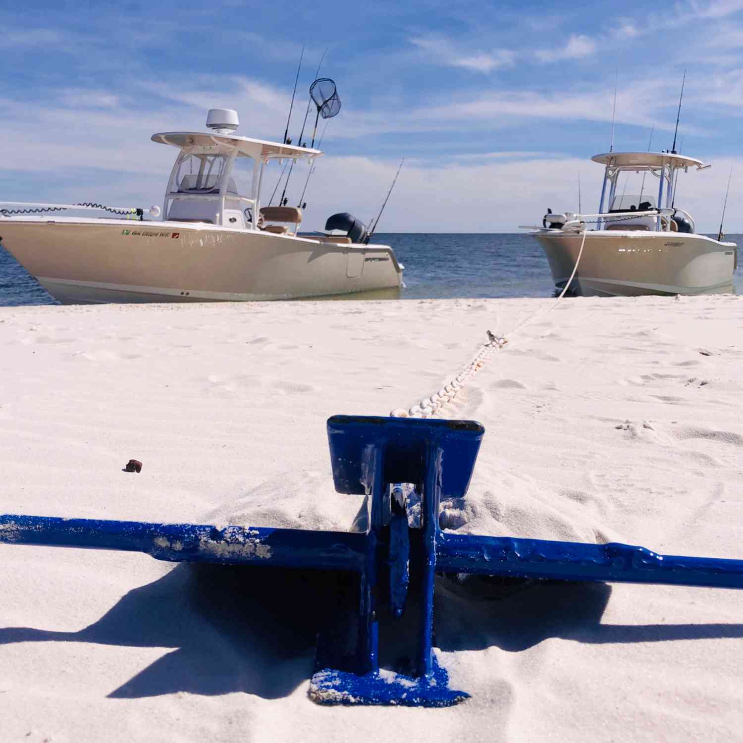 Letting the boats and us have a rest after a long rough cool March morning offshore.