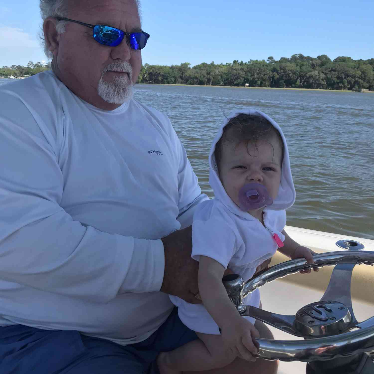 Never too young to learn.  Lil Aubrey loves to take the wheel.