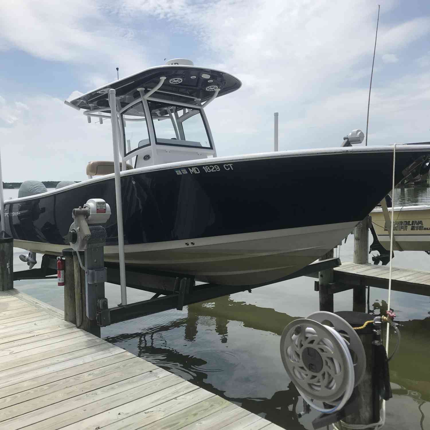 Our open 252 up on the lift and all clean after a successful day on the water.