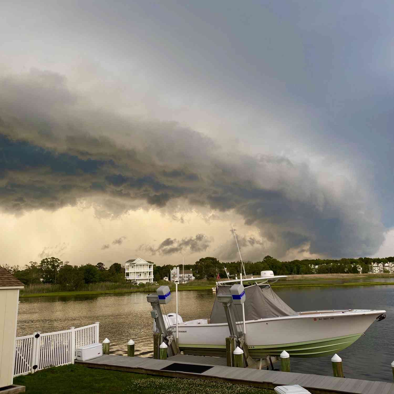 Boat all cleaned up and covered just in time for this amazing front to roll thru the backyard.