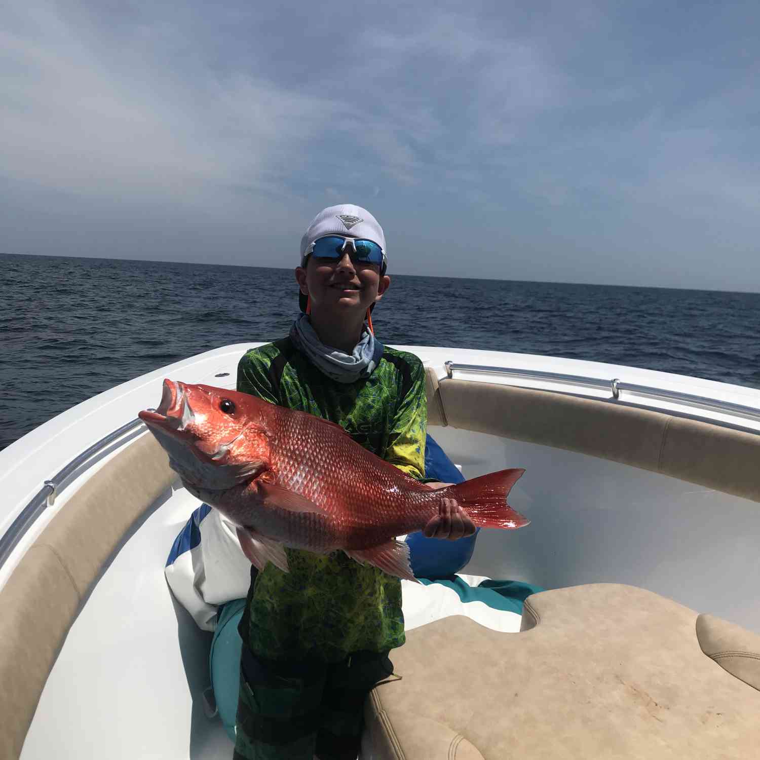 He was super excited to reel in this beautiful red snapper!