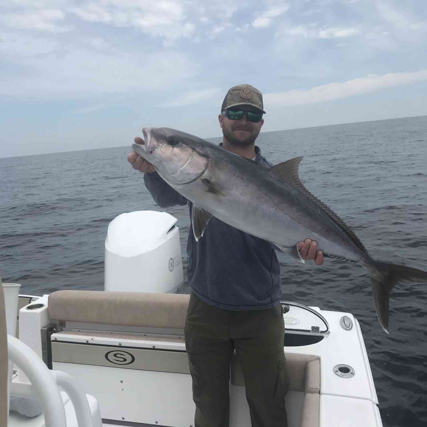 My son catching a Amberjack