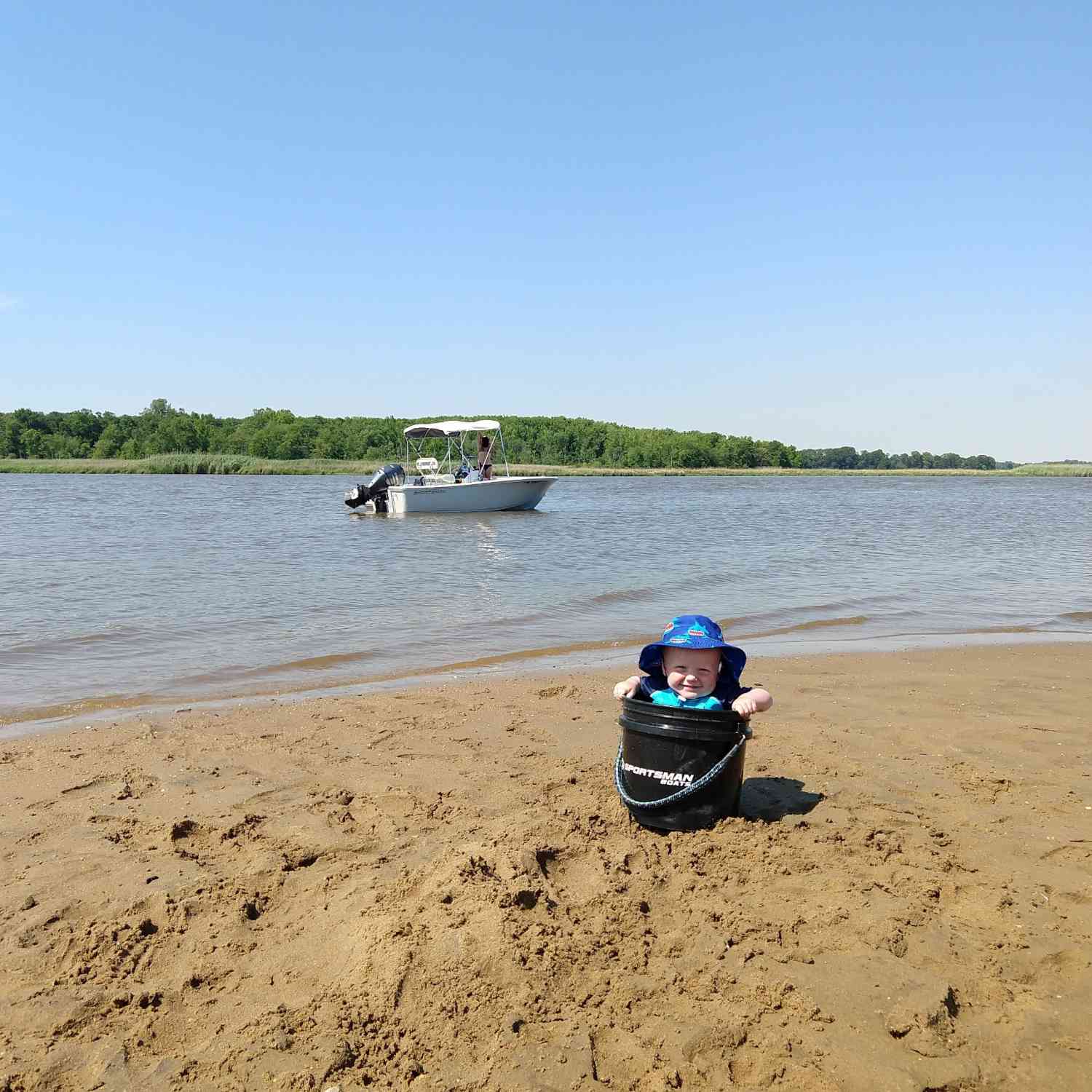 Our boys love to play on the beaches of the Chester River. Our youngest got himself into  a bucket and...