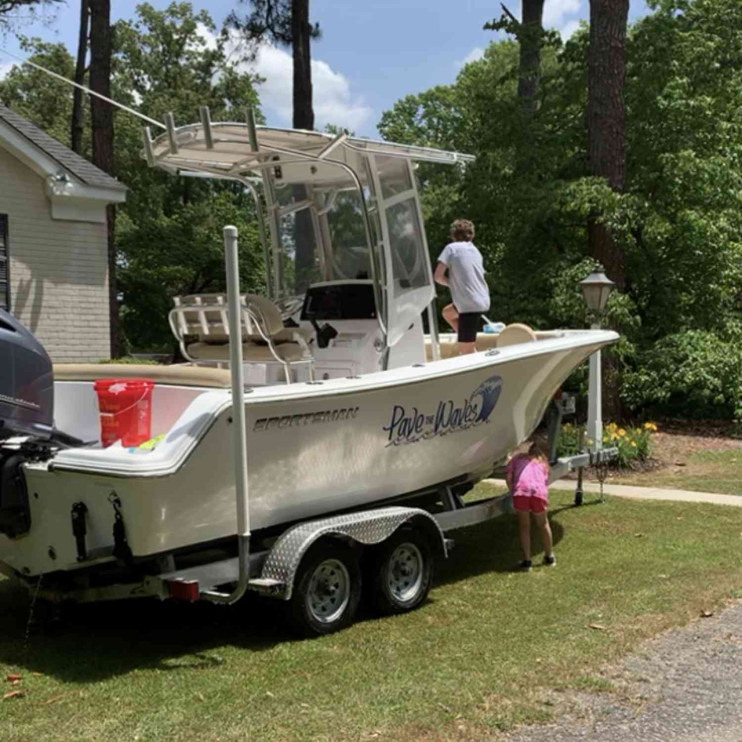 The kids take pride in cleaning the boat for the next adventure. This was taken prior to taking her to...