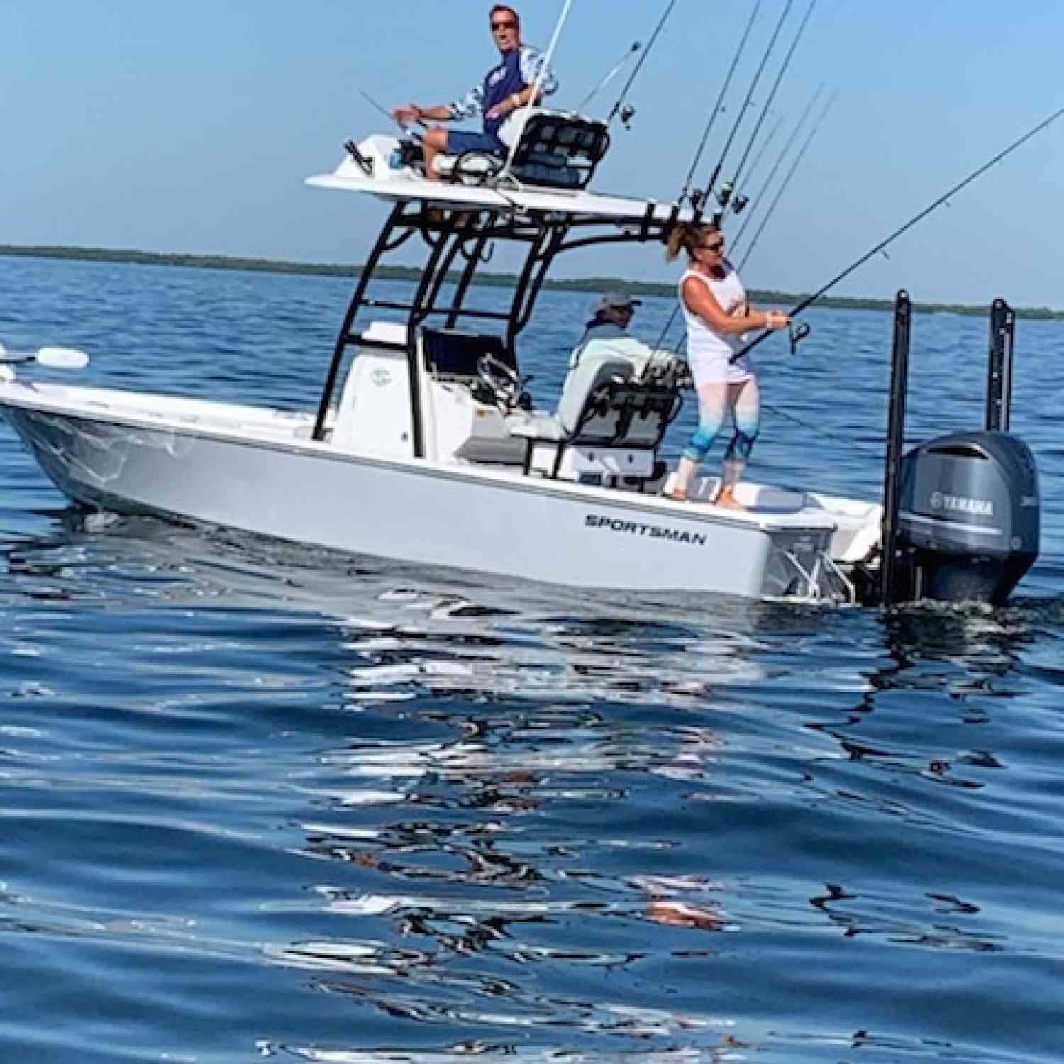 Title: Fish On! - On board their Sportsman Heritage 241 Center Console - Location: Punta Gorda Florida. Participating in the Photo Contest #SportsmanJune2020
