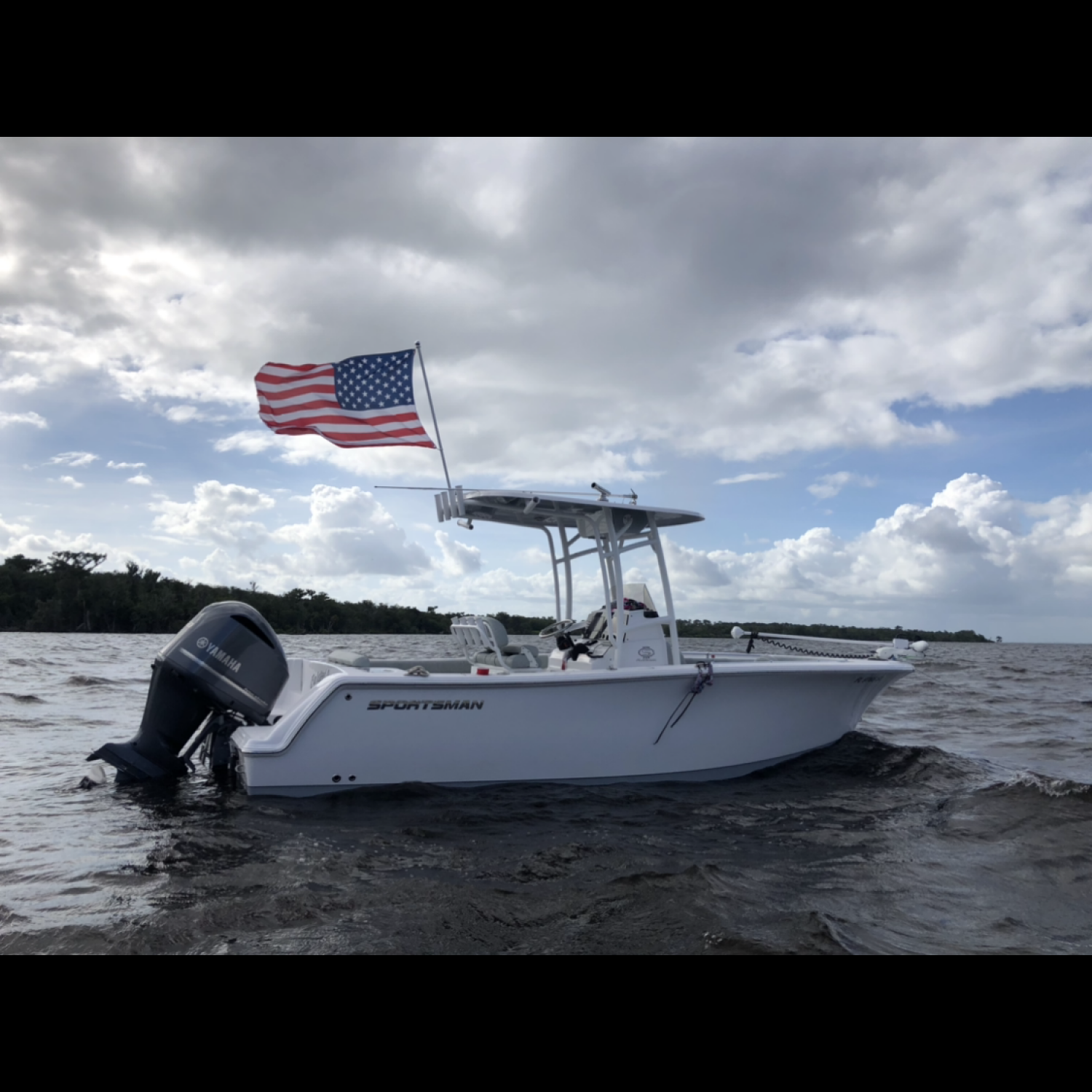 232 Open with Old Glory waving in the wind