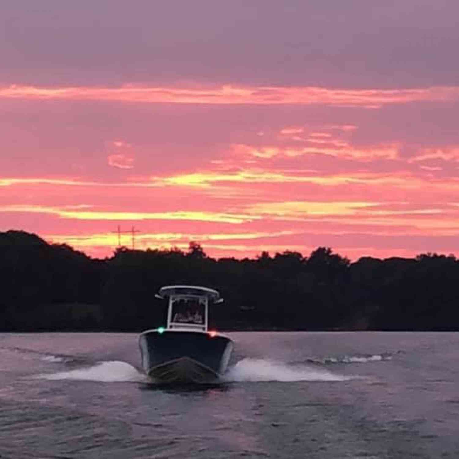 Title: Fleeing the Storm - On board their Sportsman Open 212 Center Console - Location: Lake Jordan Alabama. Participating in the Photo Contest #SportsmanSeptember2020