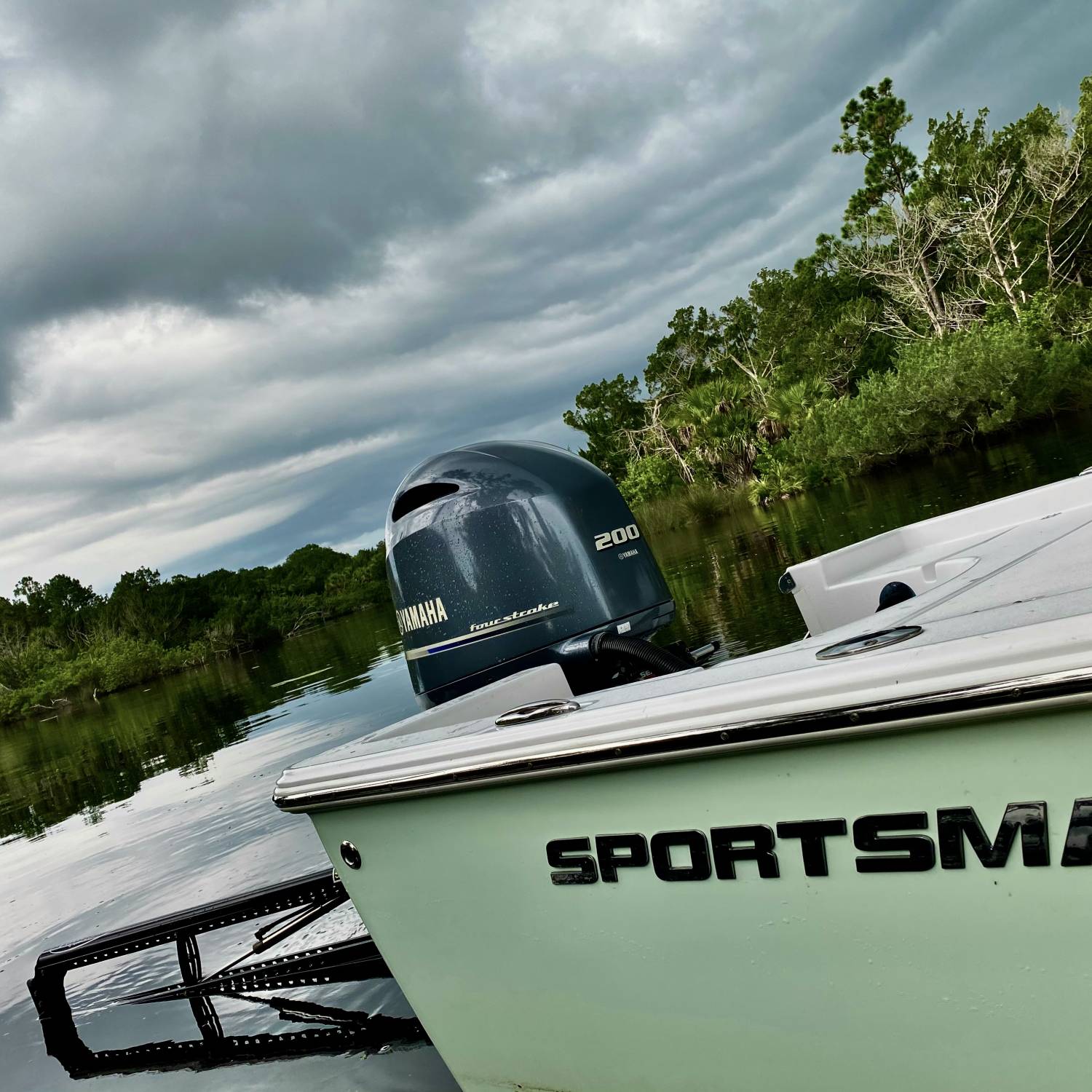 Title: beating the storm - On board their Sportsman Masters 227 Bay Boat - Location: ormond beach. Participating in the Photo Contest #SportsmanAugust2021