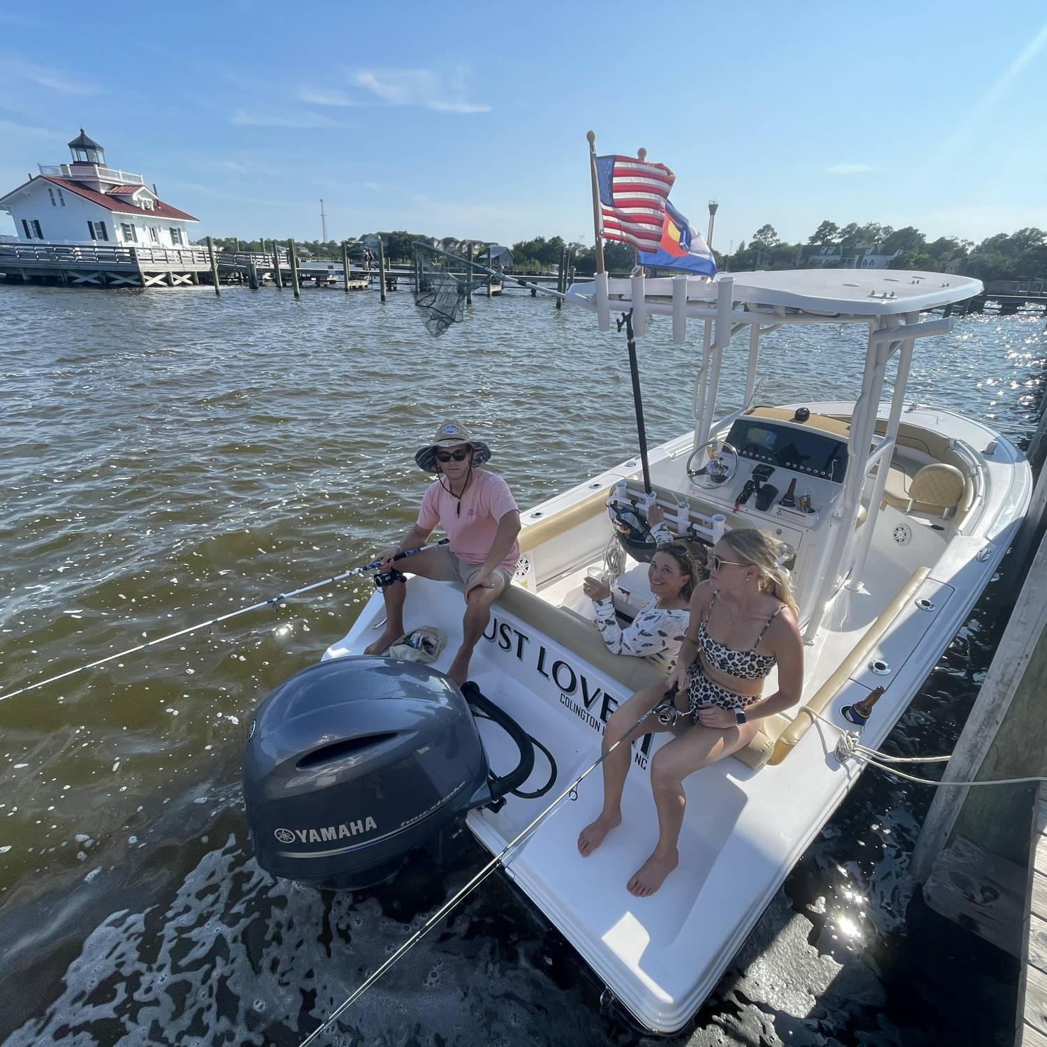 Catching some fish right next to the Manteo lighthouse.