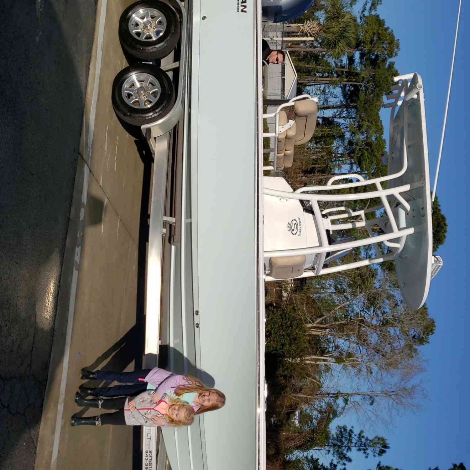 My 2 daughters with our new boat on pick up day!