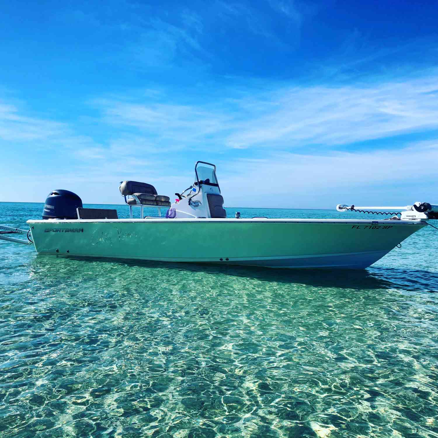 Family day at the beach. Perfect weather. Perfect water. Perfect boat.