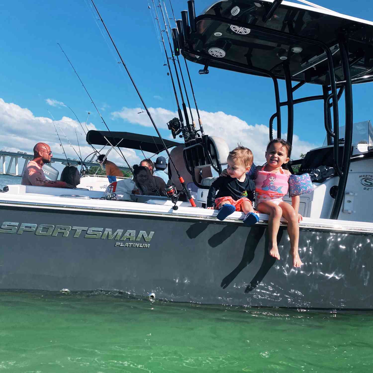 Our daughter and son enjoying a beach trip with family and friends on Sunday Funday.