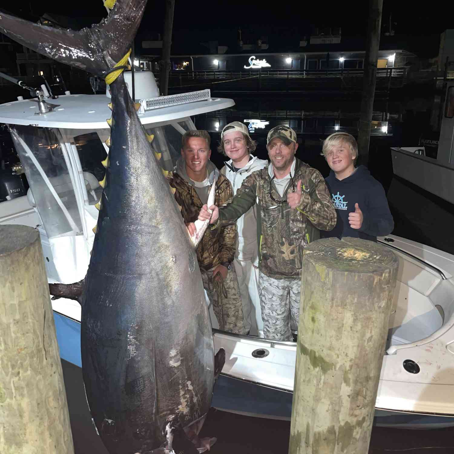 Caught this monster blue fin tuna(607 Core Weight 108 Inches Long) on my 252 Sportsman in January