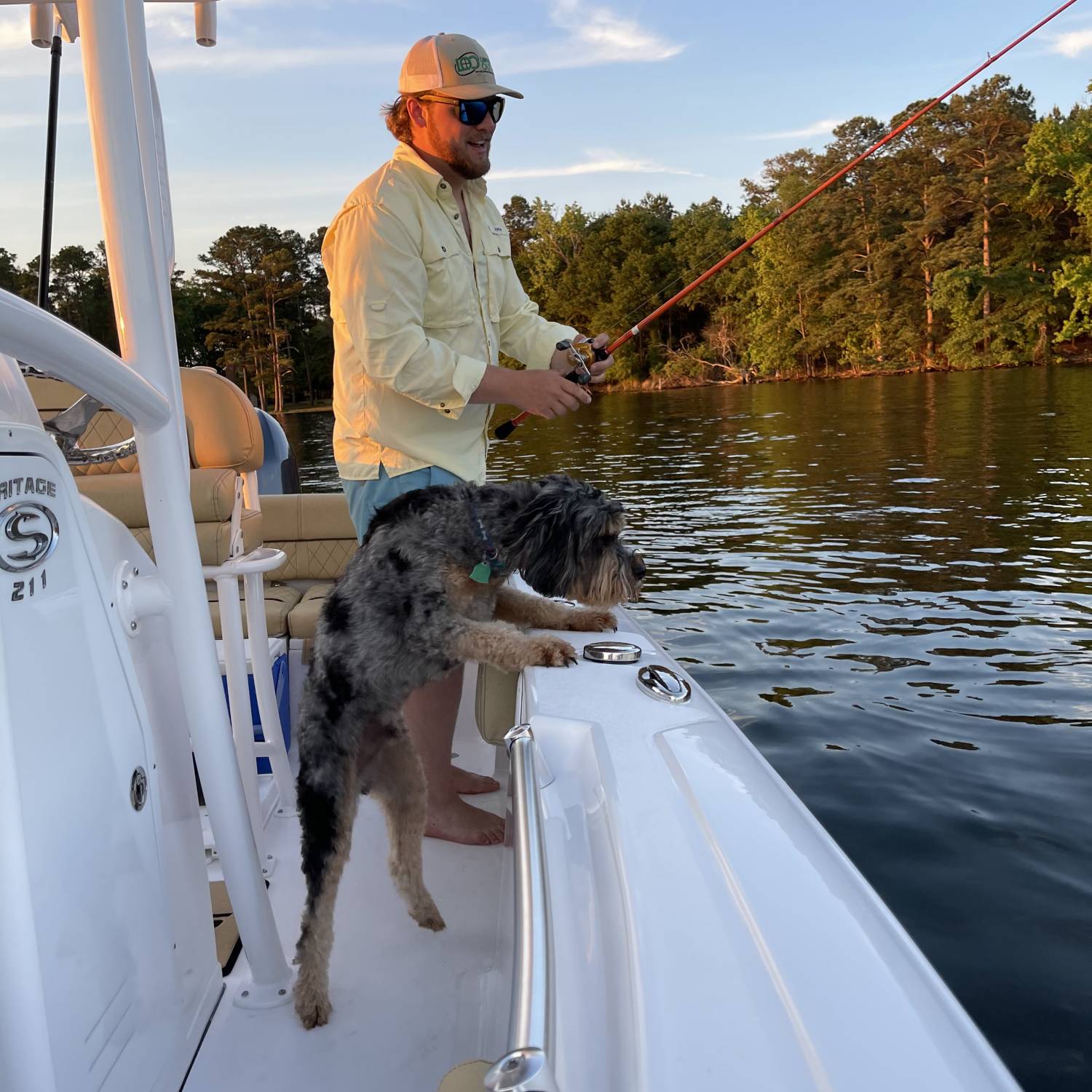 Title: Mans Best Friend - On board their Sportsman Heritage 211 Center Console - Location: Lake Murray South Carolina. Participating in the Photo Contest #SportsmanOctober2021